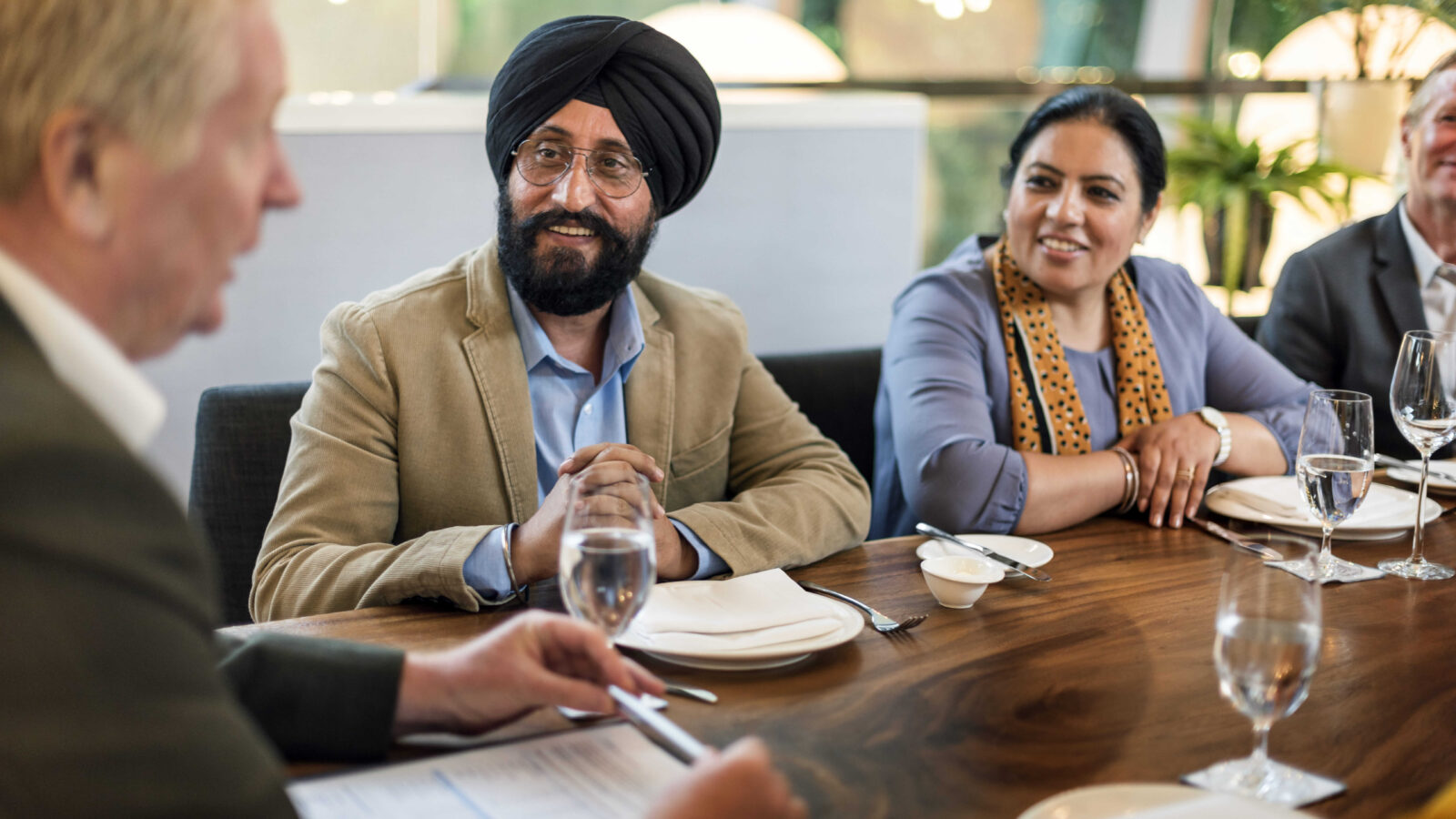 Illustration depicting the top five challenges for Global Capability Centers (GCCs) in 2025: talent acquisition, skills development, hybrid work management, cost-effective innovation, and regulatory compliance, highlighting strategic solutions for each.